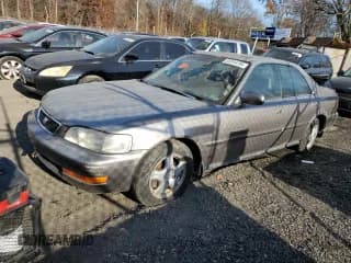 ✅ 1996 Acura TL Premium • VIN: JH4UA2655TC022431 • Лот: 92844785. Опубликован ранее на Copart с пробегом 197 314 миль. Бесплатный доступ к архиву аукционных продаж из США и подробный отчёт об истории автомобиля на DreamBid. Изображение 1.