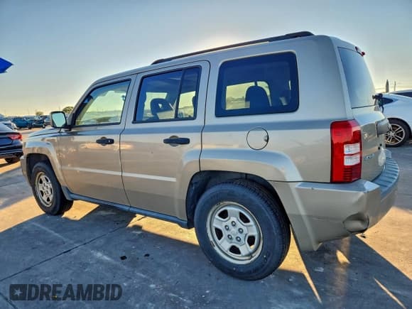 ✅ 2009 Jeep Patriot Sport • VIN: 1J4FF28B89D152585 • Lot: 94409145. Listed on Copart with 156,494 mi. Free auction sales archive from the USA and detailed vehicle history report at DreamBid. Image 2.
