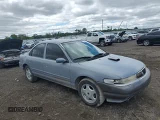 ✅ 1995 Mercury Mystique • VIN: 1MELM66L6SK613770 • Лот: 57104065. Опубликован ранее на Copart с пробегом 91 336 миль. Бесплатный доступ к архиву аукционных продаж из США и подробный отчёт об истории автомобиля на DreamBid. Изображение 4.