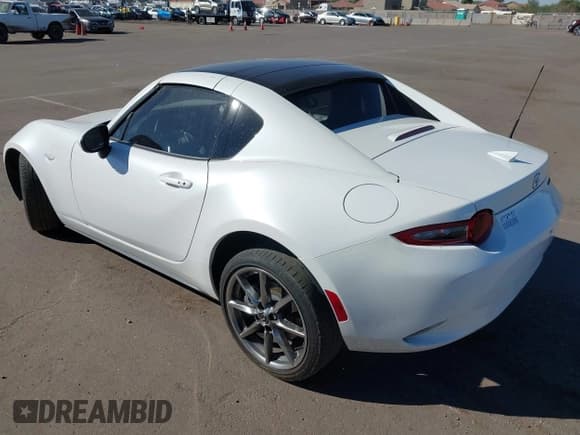 ✅ 2023 Mazda MX-5 Miata Grand Touring • VIN: JM1NDAM72P0558949 • Lot: 43536372. Listed on IAAI with 17,615 mi. Free auction sales archive from the USA and detailed vehicle history report at DreamBid. Image 3.