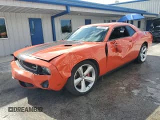 ✅ 2009 Dodge Challenger SRT-8 • VIN: 2B3LJ74W19H570052 • Lot: 65060235. Wystawiony na Copart z przebiegiem 34 746 mil. Bezpłatny archiwum sprzedaży aukcyjnych z USA i szczegółowy raport historii pojazdu na DreamBid. Zdjęcie 1.