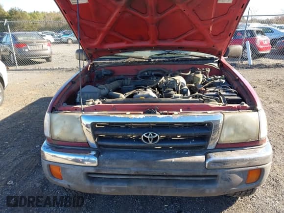 ✅ 1999 Toyota Tacoma • VIN: 4TAPM62N9XZ527714 • Lot: 43663649. Listed on IAAI with 170,264 mi. Free auction sales archive from the USA and detailed vehicle history report at DreamBid. Image 6.