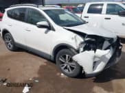 ✅ 2016 Toyota RAV4 XLE • VIN: JTMWFREVXGJ077657 • Lot: 43300105. Listed on IAAI with 140,754 mi. Free auction sales archive from the USA and detailed vehicle history report at DreamBid. Image 1.