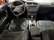 ✅ 2018 Volkswagen Tiguan SEL Premium • VIN: 3VV5B7AX8JM192448 • Лот: 91303175. Опубликован ранее на Copart с пробегом 74 866 миль. Бесплатный доступ к архиву аукционных продаж из США и подробный отчёт об истории автомобиля на DreamBid. Изображение 8.