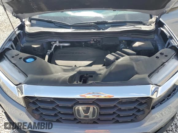 ✅ 2022 Honda Passport EX-L • VIN: 5FNYF8H52NB031405 • Lot: 57150355. Listed on Copart with 55,152 mi. Free auction sales archive from the USA and detailed vehicle history report at DreamBid. Image 12.