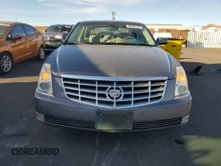 ✅ 2007 Cadillac DTS Luxury I • VIN: 1G6KD57Y17U114276 • Lot: 89559125. Wystawiony na Copart z przebiegiem 112 938 mil. Bezpłatny archiwum sprzedaży aukcyjnych z USA i szczegółowy raport historii pojazdu na DreamBid. Zdjęcie 5.