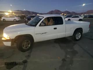 ✅ 2001 Dodge Dakota Sport • VIN: 1B7GL22N71S341217 • Lot: 86552684. Wystawiony na Copart z przebiegiem 149 608 mil. Bezpłatny archiwum sprzedaży aukcyjnych z USA i szczegółowy raport historii pojazdu na DreamBid. Zdjęcie 1.