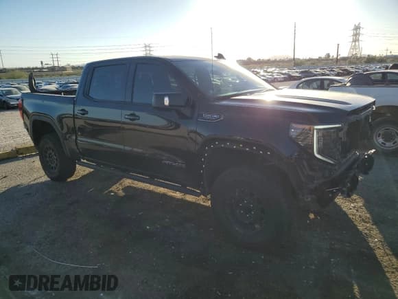 ✅ 2024 GMC Sierra 1500 AT4X • VIN: 3GTUUFEL2RG286471 • Лот: 90854675. Опубликован ранее на Copart с пробегом 25 288 миль. Бесплатный доступ к архиву аукционных продаж из США и подробный отчёт об истории автомобиля на DreamBid. Изображение 4.