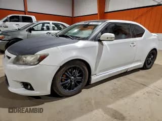 ✅ 2011 Scion tC • VIN: JTKJF5C79B3006656 • Lot: 94375385. Listed on Copart with 406,510 mi. Free auction sales archive from the USA and detailed vehicle history report at DreamBid. Image 1.