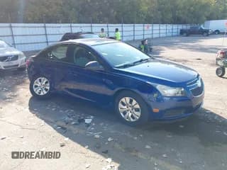 ✅ 2013 Chevrolet Cruze LS • VIN: 1G1PA5SH3D7245991 • Lot: 43261534. Listed on IAAI with 121,201 mi. Free auction sales archive from the USA and detailed vehicle history report at DreamBid. Image 1.