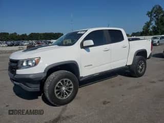 2018 Chevrolet Colorado 4WD ZR2 with VIN 1GCGTEEN9J1107499, listed as a Copart auction lot 71504115 with 147,803 mi miles and Salvage title. Bid and sale history available at DreamBid. Image 1.