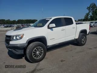 ✅ 2018 Chevrolet Colorado 4WD ZR2 • VIN: 1GCGTEEN9J1107499 • Лот: 71504115. Опубликован ранее на Copart с пробегом 147 803 миль. Бесплатный доступ к архиву аукционных продаж из США и подробный отчёт об истории автомобиля на DreamBid. Изображение 1.