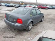 ✅ 2003 Volkswagen Jetta GL • VIN: 3VWRK69M03M159898 • Lot: 41474530. Listed on IAAI with 237,485 mi. Free auction sales archive from the USA and detailed vehicle history report at DreamBid. Image 4.