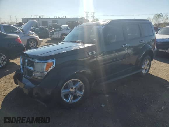 2007 Dodge Nitro SLT с VIN 1D8GU58K07W636173, выставлен на аукционе Copart как лот 72810434 с пробегом 227 882 миль миль и Списание • Salvage title. История ставок и продаж доступна на DreamBid. Изображение 1.