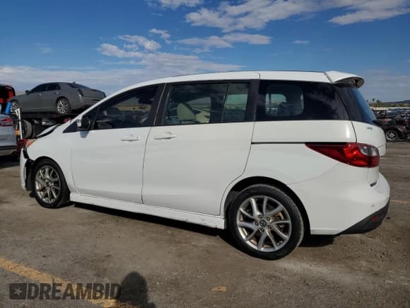 ✅ 2013 Mazda 5 Touring • VIN: JM1CW2CL2D0151635 • Лот: 85765165. Опубликован ранее на Copart с пробегом 194 381 миль. Бесплатный доступ к архиву аукционных продаж из США и подробный отчёт об истории автомобиля на DreamBid. Изображение 2.
