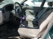 ✅ 1998 Ford Escort SE • VIN: 3FAFP15P5WR230715 • Lot: 58982595. Listed on Copart with 112,250 mi. Free auction sales archive from the USA and detailed vehicle history report at DreamBid. Image 7.