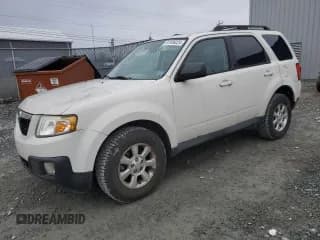 ✅ 2011 Mazda Tribute Grand Touring • VIN: 4F2CY9GG5BKM00754 • Лот: 81936224. Опубликован ранее на Copart с пробегом 124 454 миль. Бесплатный доступ к архиву аукционных продаж из США и подробный отчёт об истории автомобиля на DreamBid. Изображение 1.