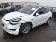 ✅ 2022 Tesla Model Y Long Range • VIN: 7SAYGAEE2NF384464 • Lot: 43618517. Listed on IAAI with 66,844 mi. Free auction sales archive from the USA and detailed vehicle history report at DreamBid. Image 2.