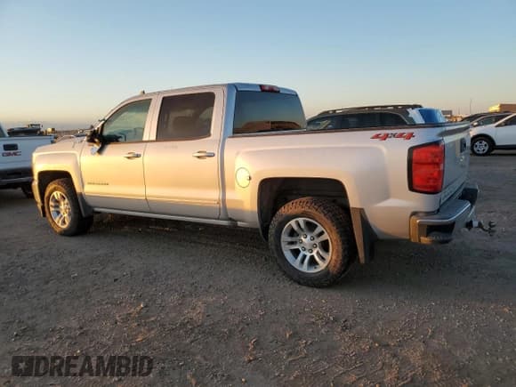 ✅ 2018 Chevrolet Silverado 1500 LT • VIN: 3GCUKREC6JG425562 • Лот: 82734105. Опубликован ранее на Copart с пробегом 143 221 миль. Бесплатный доступ к архиву аукционных продаж из США и подробный отчёт об истории автомобиля на DreamBid. Изображение 2.