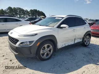 ✅ 2022 Hyundai Kona SEL • VIN: KM8K62AB2NU870850 • Лот: 71906515. Опубликован ранее на Copart с пробегом 63 936 миль. Бесплатный доступ к архиву аукционных продаж из США и подробный отчёт об истории автомобиля на DreamBid. Изображение 1.