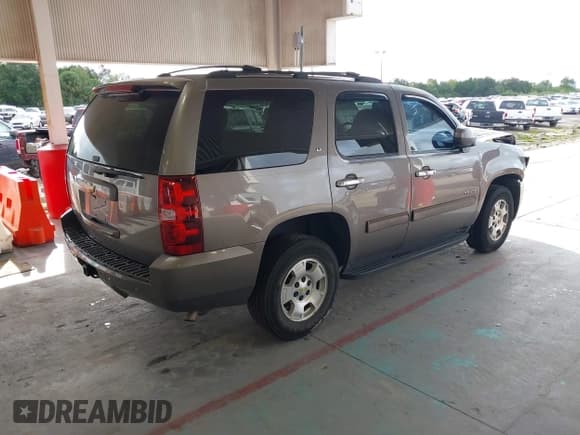 ✅ 2014 Chevrolet Tahoe LT • VIN: 1GNSCBE09ER193327 • Lot: 43187109. Listed on IAAI with 168,647 mi. Free auction sales archive from the USA and detailed vehicle history report at DreamBid. Image 4.
