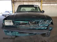 ✅ 2001 Mazda B-Series DS • VIN: 4F4YR12U31TM11995 • Лот: 74604534. Опубликован ранее на Copart с пробегом 140 015 миль. Бесплатный доступ к архиву аукционных продаж из США и подробный отчёт об истории автомобиля на DreamBid. Изображение 5.