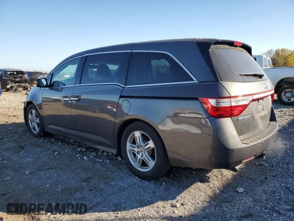 ✅ 2013 Honda Odyssey Touring • VIN: 5FNRL5H99DB071462 • Lot: 82772545. Listed on Copart with 194,573 mi. Free auction sales archive from the USA and detailed vehicle history report at DreamBid. Image 2.