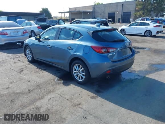 ✅ 2014 Mazda 3 i Grand Touring • VIN: JM1BM1M73E1200849 • Lot: 42789321. Listed on IAAI with 69,561 mi. Free auction sales archive from the USA and detailed vehicle history report at DreamBid. Image 3.