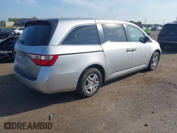 ✅ 2013 Honda Odyssey EX • VIN: 5FNRL5H45DB082818 • Lot: 43243100. Listed on IAAI with 201,051 mi. Free auction sales archive from the USA and detailed vehicle history report at DreamBid. Image 4.