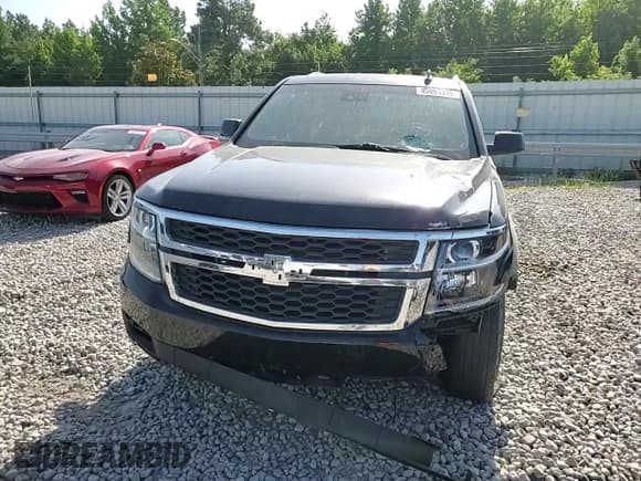 ✅ 2015 Chevrolet Tahoe LT • VIN: 1GNSKBKCXFR158606 • Lot: 65063315. Listed on Copart with 210,832 mi. Free auction sales archive from the USA and detailed vehicle history report at DreamBid. Image 14.