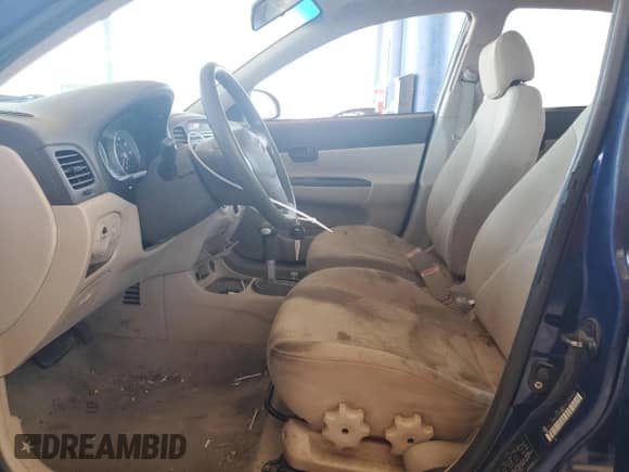 2007 Hyundai Accent GLS with VIN KMHCN46C37U137407, listed as a Copart auction lot 75026834 with 66,569 mi miles and Salvage title. Bid and sale history available at DreamBid. Image 7.