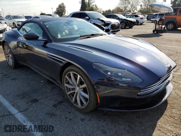 ✅ 2019 Aston Martin DB11 • VIN: SCFRMFCWXKGM06913 • Лот: 43062865. Опубликован ранее на Copart с пробегом 34 383 миль. Бесплатный доступ к архиву аукционных продаж из США и подробный отчёт об истории автомобиля на DreamBid. Изображение 4.