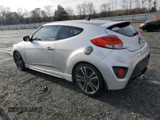 ✅ 2016 Hyundai Veloster Turbo Rally Edition • VIN: KMHTC6AE1GU272721 • Lot: 85425644. Wystawiony na Copart z przebiegiem 123 759 mil. Bezpłatny archiwum sprzedaży aukcyjnych z USA i szczegółowy raport historii pojazdu na DreamBid. Zdjęcie 2.