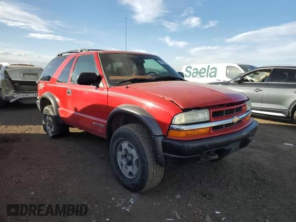 2004 Chevrolet Blazer LS with VIN 1GNCT18X34K141674, listed as a Copart auction lot 85500954 with Not provided miles and Clean title. Bid and sale history available at DreamBid. Image 4.