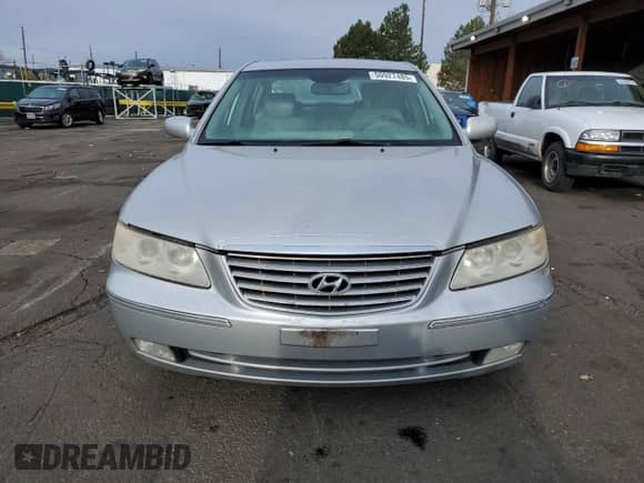2006 Hyundai Azera SE z VIN KMHFC46F36A087430, wystawiony jako Copart lot #50927485 z przebiegiem 102 868 mil mil oraz Szkoda całkowita • Salvage title. Historia ofert i sprzedaży dostępna na DreamBid. Obrazek 5.