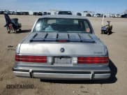 ✅ 1990 Buick Park Avenue • VIN: 1G4CW54CXL1635282 • Lot: 49225345. Wystawiony na Copart z przebiegiem 133 619 mil. Bezpłatny archiwum sprzedaży aukcyjnych z USA i szczegółowy raport historii pojazdu na DreamBid. Zdjęcie 6.