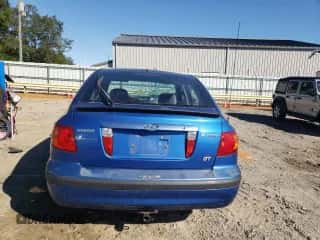 2003 Hyundai Elantra GT z VIN KMHDN55D53U101541, wystawiony jako Copart lot #76377764 z przebiegiem 170 042 mil mil oraz Szkoda całkowita • Salvage title. Historia ofert i sprzedaży dostępna na DreamBid. Obrazek 6.