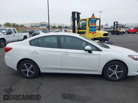 ✅ 2021 Subaru Impreza Premium • VIN: 4S3GKAV61M3604298 • Лот: 42011198. Опубликован ранее на IAAI с пробегом 50 667 миль. Бесплатный доступ к архиву аукционных продаж из США и подробный отчёт об истории автомобиля на DreamBid. Изображение 14.