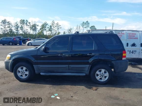 ✅ 2007 Ford Escape XLS • VIN: 1FMYU02Z57KA67156 • Lot: 43779242. Listed on IAAI with Not provided. Free auction sales archive from the USA and detailed vehicle history report at DreamBid. Image 14.