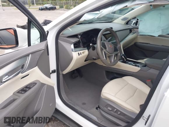 ✅ 2023 Cadillac XT5 AWD Premium Luxury • VIN: 1GYKNDRSXPZ104274 • Lot: 43569714. Listed on IAAI with 49,006 mi. Free auction sales archive from the USA and detailed vehicle history report at DreamBid. Image 5.