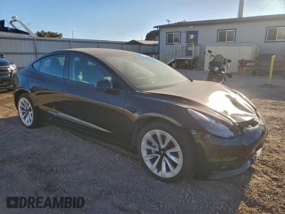 ✅ 2022 Tesla Model 3 • VIN: 5YJ3E1EA9NF323218 • Лот: 93991255. Опубликован ранее на Copart с пробегом 1 988 миль. Бесплатный доступ к архиву аукционных продаж из США и подробный отчёт об истории автомобиля на DreamBid. Изображение 4.