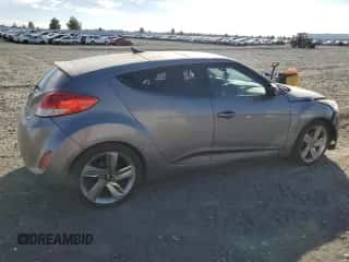 2012 Hyundai Veloster w/Red Int z VIN KMHTC6AD4CU033777, wystawiony jako Copart lot #72250544 z przebiegiem 136 087 mil mil oraz Szkoda całkowita • Salvage title. Historia ofert i sprzedaży dostępna na DreamBid. Obrazek 3.