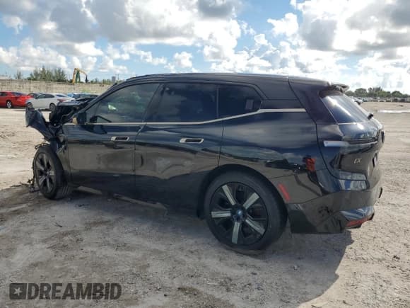 ✅ 2023 BMW iX xDrive50 • VIN: WB523CF06PCM84978 • Lot: 83930225. Listed on Copart with 54,159 mi. Free auction sales archive from the USA and detailed vehicle history report at DreamBid. Image 2.