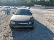 ✅ 1999 Mazda Protege DX • VIN: JM1BJ2222X0126273 • Lot: 75479364. Wystawiony na Copart z przebiegiem 293 952 mil. Bezpłatny archiwum sprzedaży aukcyjnych z USA i szczegółowy raport historii pojazdu na DreamBid. Zdjęcie 11.