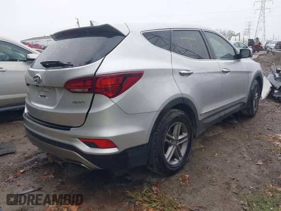2017 Hyundai Santa Fe 2.4L z VIN 5XYZT3LB1HG437508, wystawiony jako IAAI lot #43278655 z przebiegiem 104 863 mil mil oraz . Historia ofert i sprzedaży dostępna na DreamBid. Obrazek 4.
