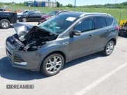 ✅ 2015 Ford Escape Titanium • VIN: 1FMCU9J92FUB01007 • Lot: 42319246. Listed on IAAI with 90,782 mi. Free auction sales archive from the USA and detailed vehicle history report at DreamBid. Image 2.