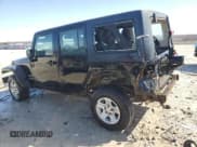 ✅ 2014 Jeep Wrangler Unlimited Sport RHD • VIN: 1C4BJWKG2EL158624 • Lot: 51057295. Listed on Copart with 186,392 mi. Free auction sales archive from the USA and detailed vehicle history report at DreamBid. Image 2.