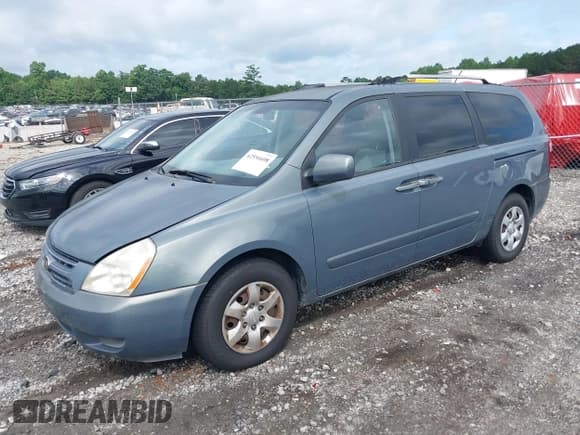 ✅ 2009 Kia Sedona EX • VIN: KNDMB233996311708 • Lot: 42556608. Listed on IAAI with 203,137 mi. Free auction sales archive from the USA and detailed vehicle history report at DreamBid. Image 2.