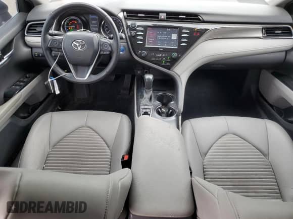 2020 Toyota Camry Hybrid SE с VIN 4T1G31AK1LU019757, выставлен на аукционе Copart как лот 70887205 с пробегом 76 845 миль миль и Списание • Salvage title. История ставок и продаж доступна на DreamBid. Изображение 8.
