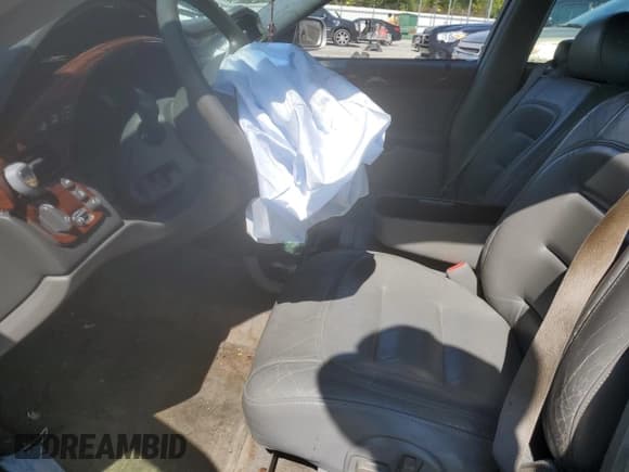 ✅ 2001 Cadillac DeVille • VIN: 1G6KD54Y61U241472 • Lot: 69449404. Listed on Copart with 104,543 mi. Free auction sales archive from the USA and detailed vehicle history report at DreamBid. Image 7.